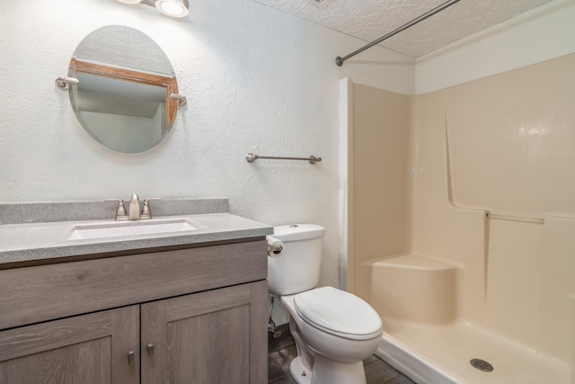 150 Sunken Forest Dr Unit 190, Forsyth, MO 65653 - full bath with a shower stall, vanity, toilet, wood finished floors, and an ornate ceiling