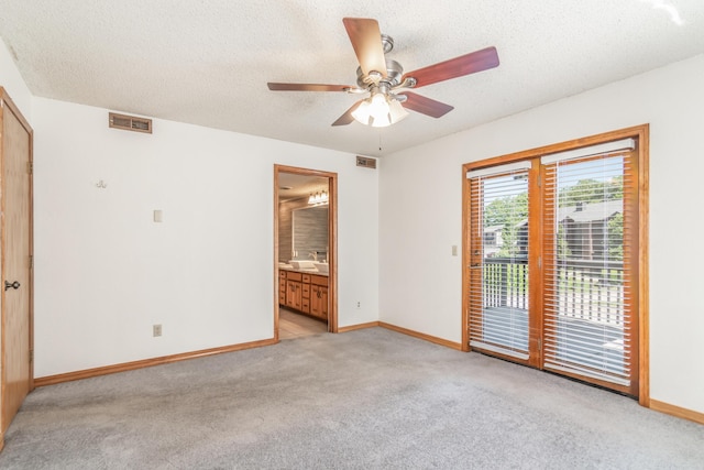 150 Sunken Forest Dr Unit 190, Forsyth, MO 65653 - spare room with light carpet, ceiling fan, baseboards, and a textured ceiling