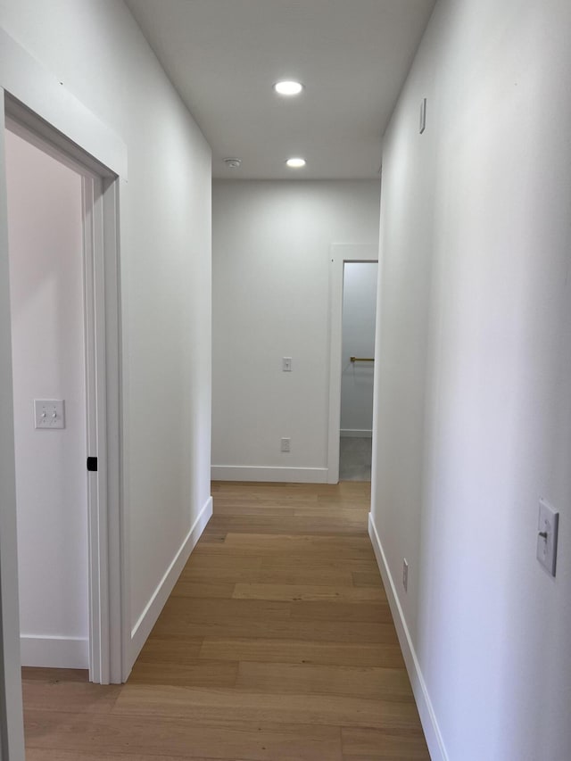 2077 N Sun Valley Dr, Springfield, MO 65802 - hall with recessed lighting, light wood-style floors, and baseboards