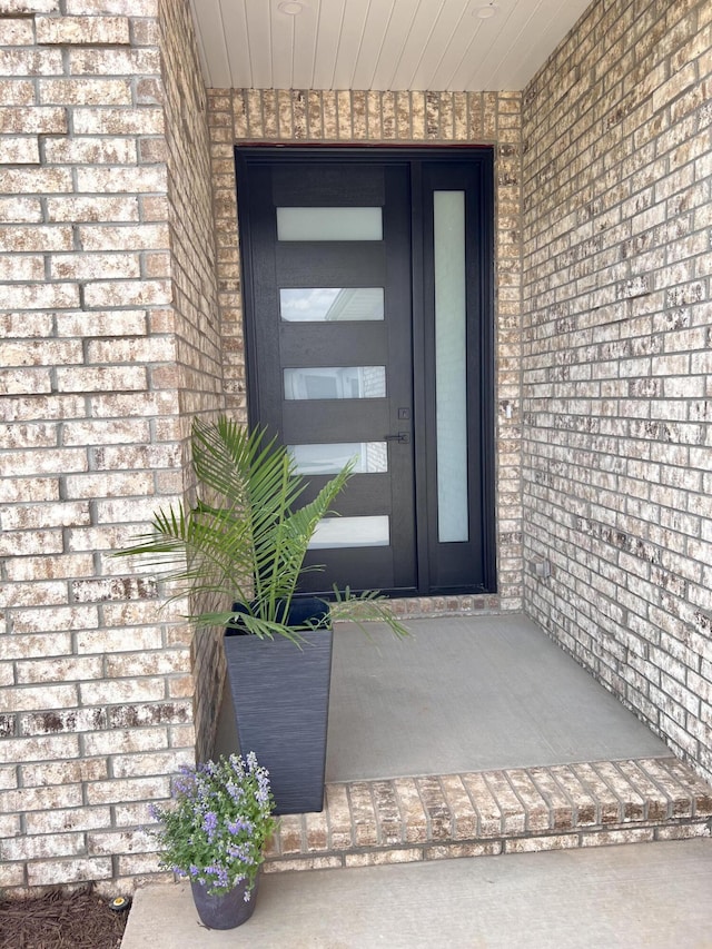 2077 N Sun Valley Dr, Springfield, MO 65802 - view of exterior entry with brick siding