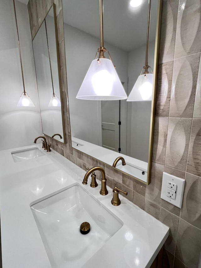 2077 N Sun Valley Dr, Springfield, MO 65802 - bathroom featuring backsplash, double vanity, and tile walls