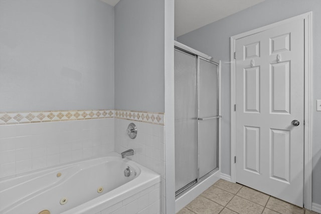 805 S Benson Pl, Nixa, MO 65714 - bathroom featuring a stall shower, tile patterned flooring, and a whirlpool tub