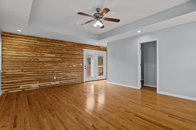 805 S Benson Pl, Nixa, MO 65714 - unfurnished room featuring recessed lighting, a ceiling fan, wood finished floors, baseboards, and a raised ceiling