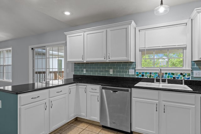 805 S Benson Pl, Nixa, MO 65714 - kitchen featuring dishwasher, a sink, white cabinets, a peninsula, and decorative backsplash