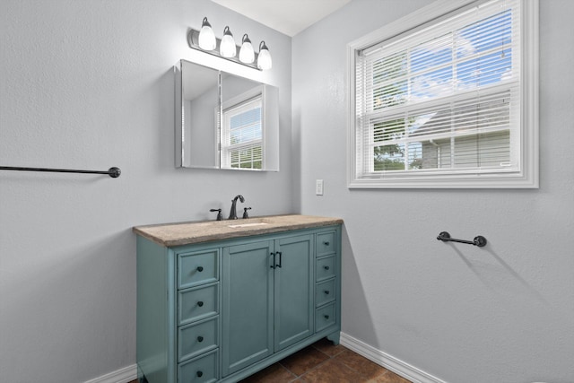 805 S Benson Pl, Nixa, MO 65714 - bathroom featuring baseboards and vanity