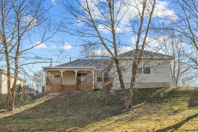 805 S Benson Pl, Nixa, MO 65714 - rear view of house featuring a porch and stairs
