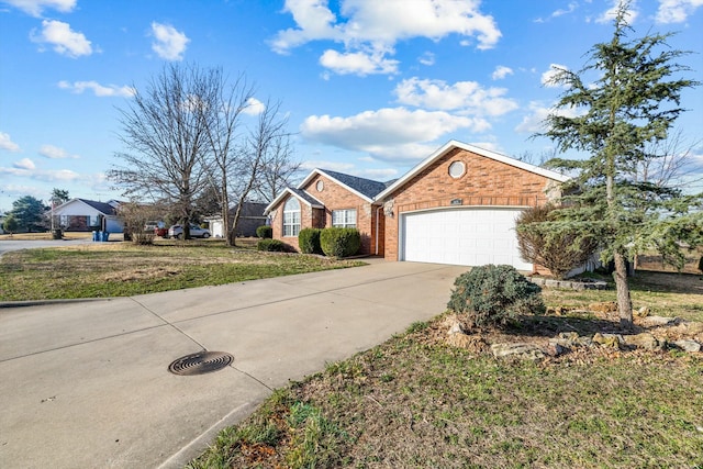 805 S Benson Pl, Nixa, MO 65714 - view of front of home featuring concrete driveway, a garage, brick siding, and a front lawn