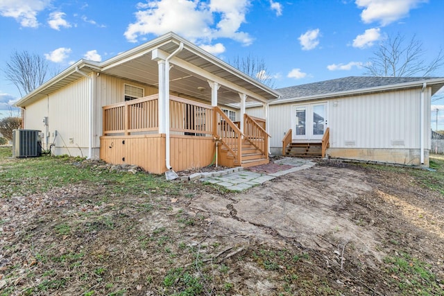 805 S Benson Pl, Nixa, MO 65714 - back of house with cooling unit, french doors, covered porch, and crawl space