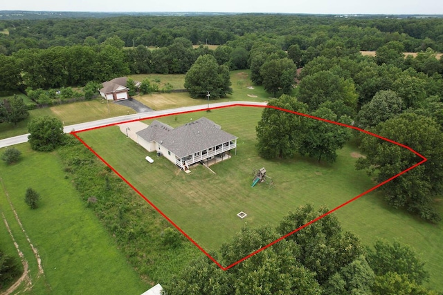view of subject property featuring property boundaries highlighted and a forest