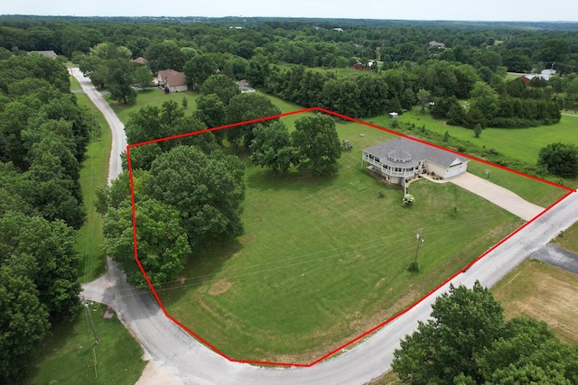 overview of rural landscape with property boundaries highlighted and a heavily wooded area