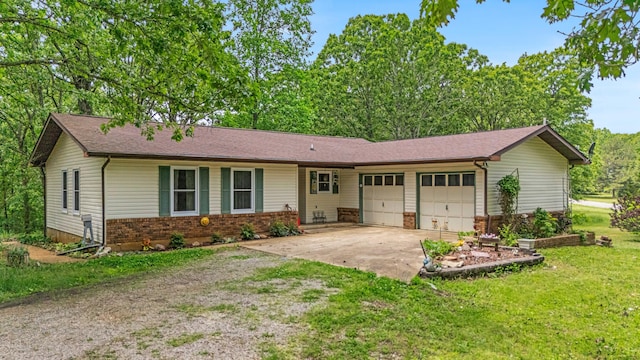 1402 State Rte K, West Plains, MO 65775 - single story home featuring dirt driveway, a garage, brick siding, and a front yard