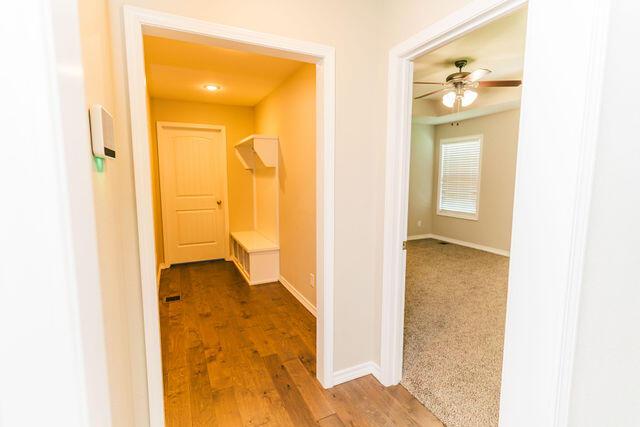 1205 N 12th Ave, Ozark, MO 65721 - hall featuring baseboards and wood finished floors