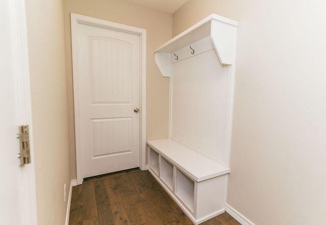 1205 N 12th Ave, Ozark, MO 65721 - mudroom with dark wood finished floors and baseboards