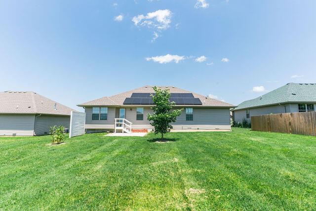 1205 N 12th Ave, Ozark, MO 65721 - rear view of house featuring solar panels