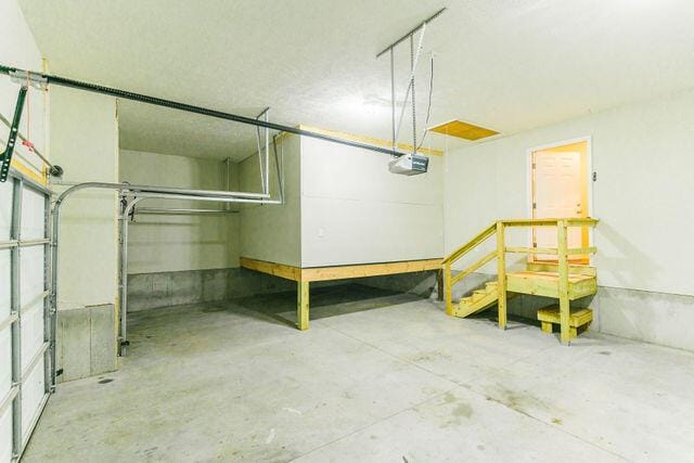 1205 N 12th Ave, Ozark, MO 65721 - garage with a garage door opener
