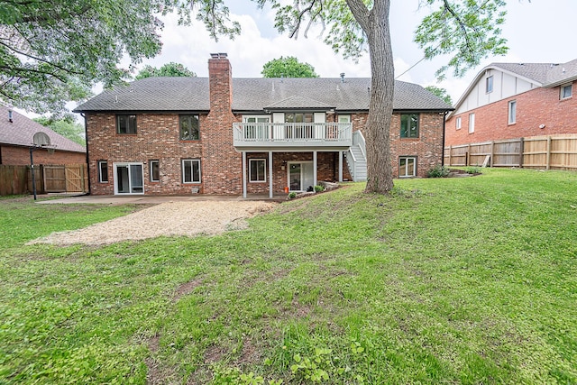 1935 E Canterbury St, Springfield, MO 65804 - rear view of property featuring stairs, a deck, a chimney, and brick siding