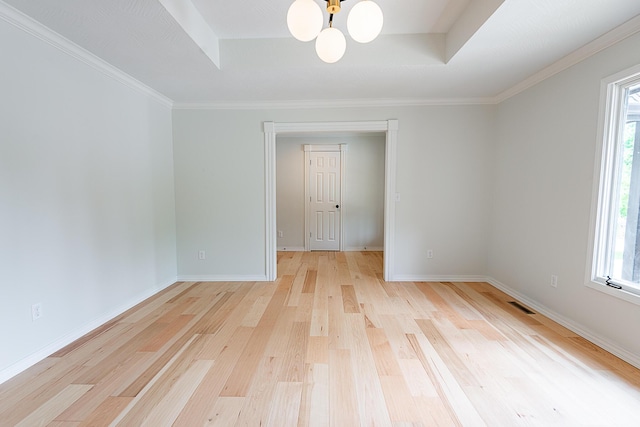 1935 E Canterbury St, Springfield, MO 65804 - spare room with healthy amount of natural light, light wood-style flooring, baseboards, and ornamental molding