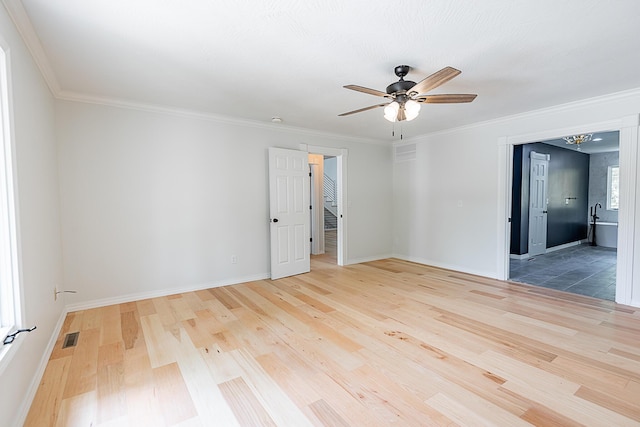 1935 E Canterbury St, Springfield, MO 65804 - empty room featuring wood finished floors, ceiling fan, baseboards, and ornamental molding
