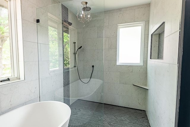 1935 E Canterbury St, Springfield, MO 65804 - bathroom featuring a freestanding tub, plenty of natural light, a walk in shower, and tile walls