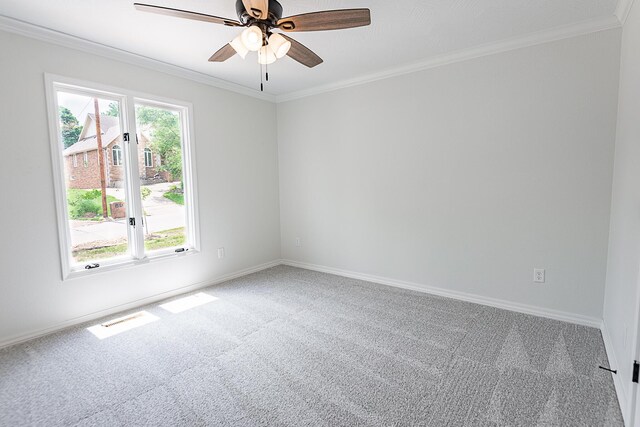 1935 E Canterbury St, Springfield, MO 65804 - carpeted spare room featuring plenty of natural light, ornamental molding, baseboards, and a ceiling fan