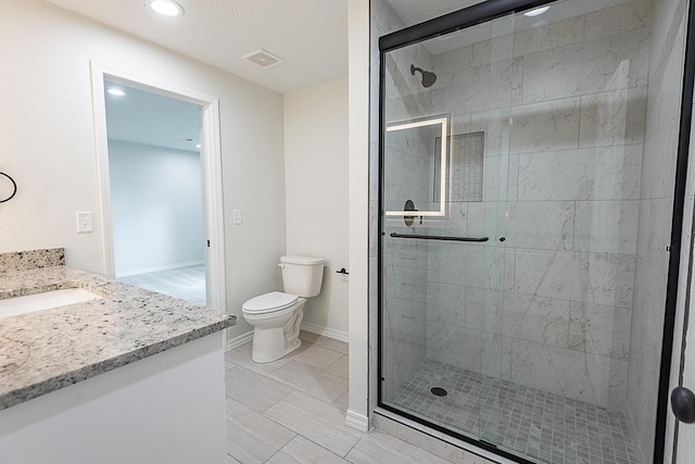 1935 E Canterbury St, Springfield, MO 65804 - full bathroom with a shower stall, toilet, recessed lighting, vanity, and baseboards