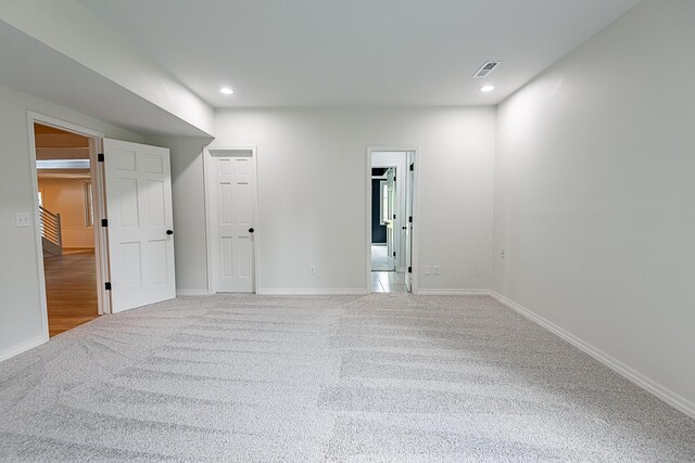 1935 E Canterbury St, Springfield, MO 65804 - unfurnished bedroom with carpet flooring, baseboards, and recessed lighting