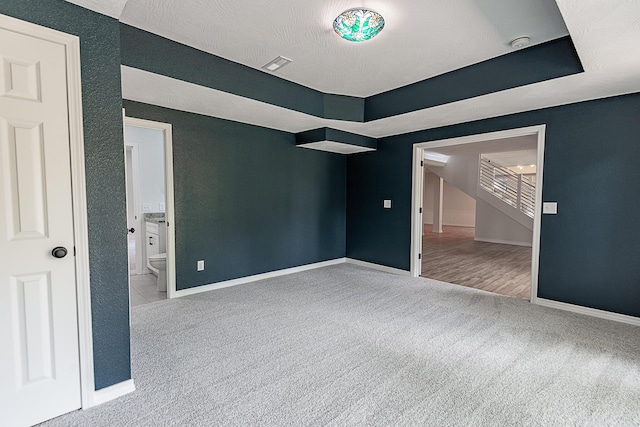 1935 E Canterbury St, Springfield, MO 65804 - empty room with carpet floors and baseboards