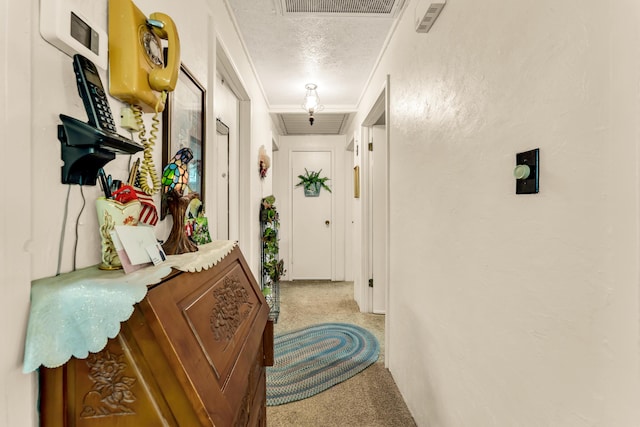 3152 Two Rivers Rd, Highlandville, MO 65669 - corridor featuring carpet floors, a textured ceiling, crown molding, and attic access