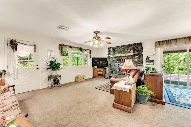 3152 Two Rivers Rd, Highlandville, MO 65669 - carpeted living area with a ceiling fan