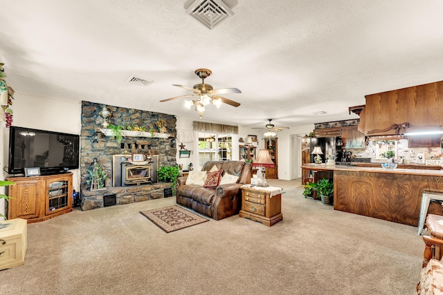 3152 Two Rivers Rd, Highlandville, MO 65669 - living room with light colored carpet, ceiling fan, and a textured ceiling