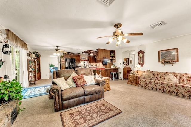 3152 Two Rivers Rd, Highlandville, MO 65669 - living area featuring a ceiling fan and light carpet
