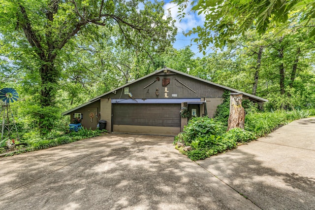 3152 Two Rivers Rd, Highlandville, MO 65669 - view of front of property with driveway and an attached garage