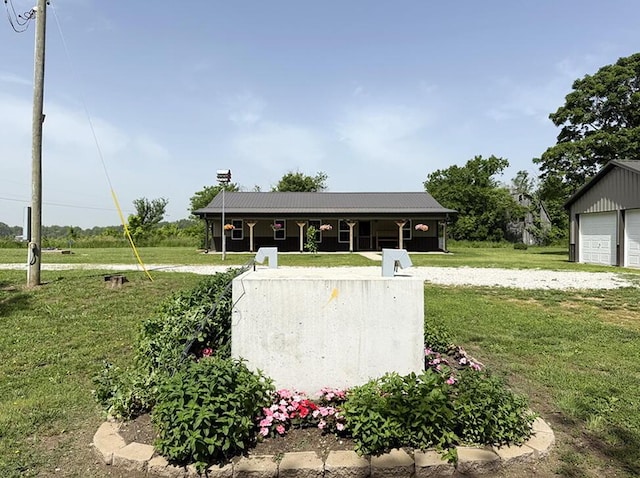 30285 E Pawhuska Rd, El Dorado Springs, MO 64744 - entry to storm shelter with a yard