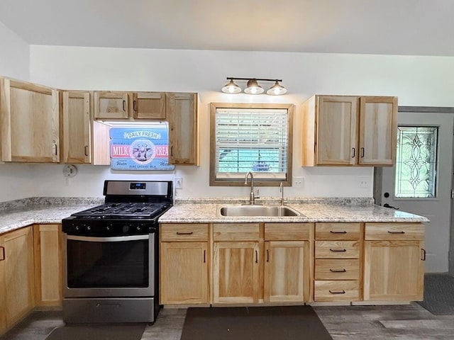 30285 E Pawhuska Rd, El Dorado Springs, MO 64744 - kitchen with gas stove, light brown cabinets, a sink, dark wood finished floors, and light stone countertops