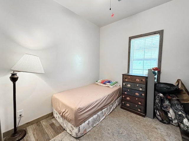 30285 E Pawhuska Rd, El Dorado Springs, MO 64744 - bedroom featuring wood finished floors