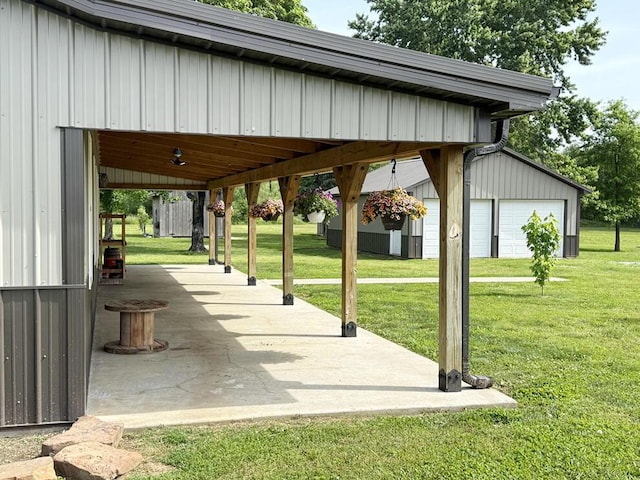30285 E Pawhuska Rd, El Dorado Springs, MO 64744 - view of home's community with a yard, an outbuilding, and a patio