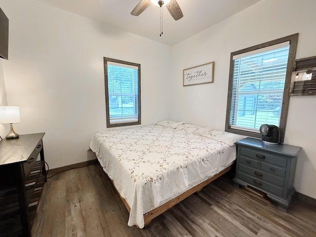 30285 E Pawhuska Rd, El Dorado Springs, MO 64744 - bedroom featuring wood finished floors, baseboards, and ceiling fan