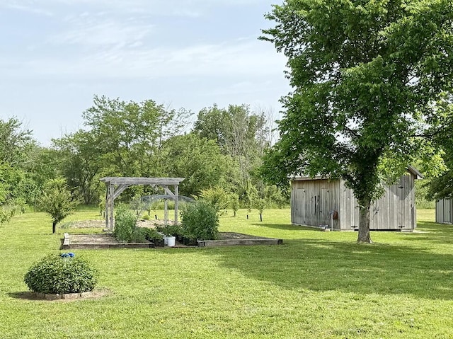 30285 E Pawhuska Rd, El Dorado Springs, MO 64744 - view of grassy yard featuring an outbuilding and a storage shed