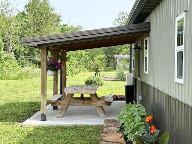 30285 E Pawhuska Rd, El Dorado Springs, MO 64744 - view of green lawn featuring a patio