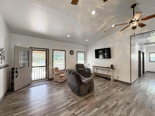 30285 E Pawhuska Rd, El Dorado Springs, MO 64744 - living room featuring ceiling fan, healthy amount of natural light, wood finished floors, recessed lighting, and lofted ceiling