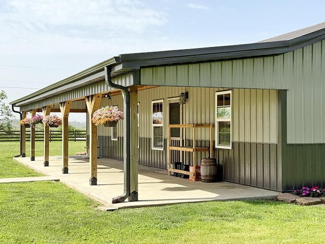 30285 E Pawhuska Rd, El Dorado Springs, MO 64744 - surrounding community featuring a patio area and a lawn