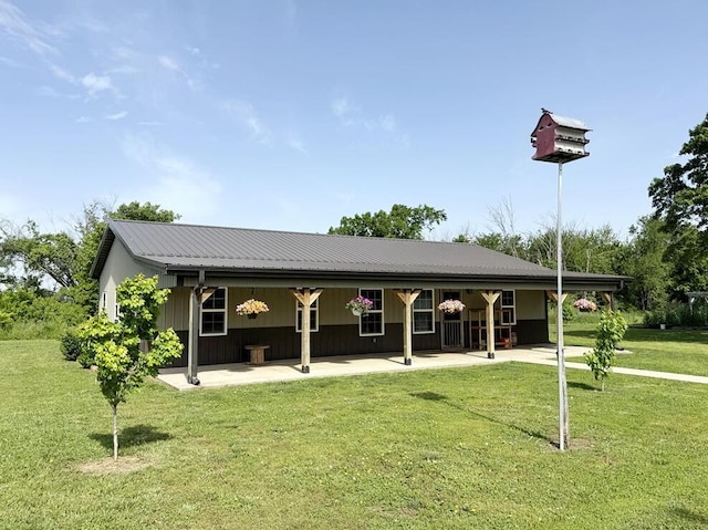 30285 E Pawhuska Rd, El Dorado Springs, MO 64744 - surrounding community with a patio and a yard