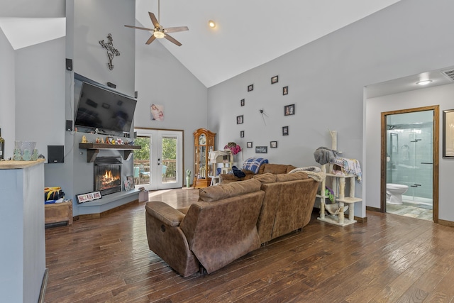 45 Stone Ridge Ct, Strafford, MO 65757 - living room featuring high vaulted ceiling, ceiling fan, wood-type flooring, a glass covered fireplace, and french doors