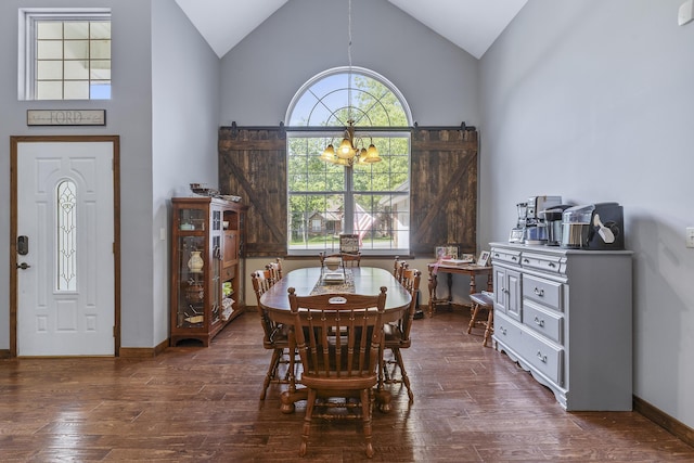 45 Stone Ridge Ct, Strafford, MO 65757 - dining space featuring a chandelier, wood finished floors, high vaulted ceiling, and baseboards