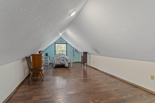 45 Stone Ridge Ct, Strafford, MO 65757 - bedroom with a textured ceiling, wood finished floors, lofted ceiling, and baseboards