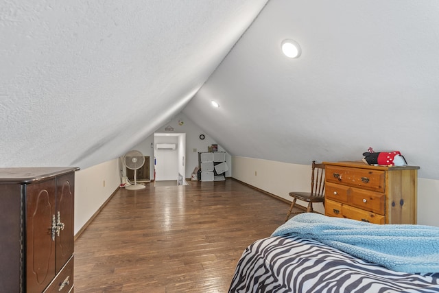 45 Stone Ridge Ct, Strafford, MO 65757 - bedroom with wood finished floors, baseboards, lofted ceiling, a wall mounted AC, and a textured ceiling