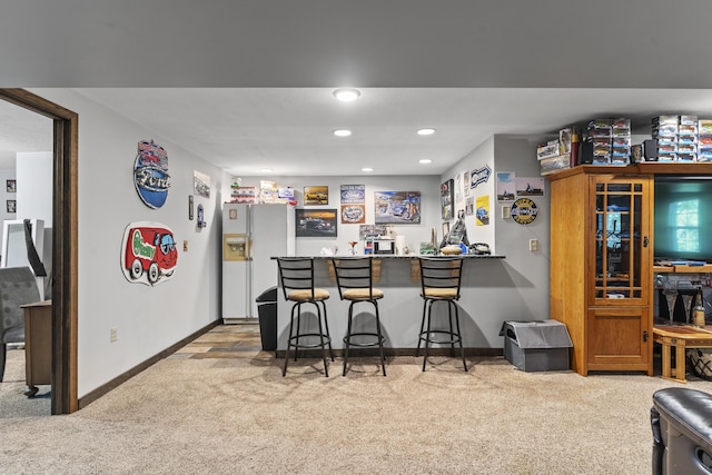 45 Stone Ridge Ct, Strafford, MO 65757 - indoor wet bar featuring white refrigerator with ice dispenser, carpet flooring, baseboards, and recessed lighting
