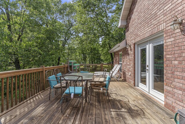 45 Stone Ridge Ct, Strafford, MO 65757 - wooden terrace with outdoor dining space and french doors