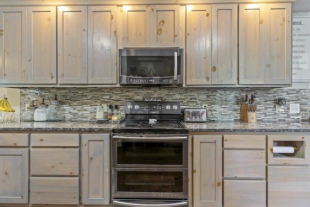 45 Stone Ridge Ct, Strafford, MO 65757 - kitchen with appliances with stainless steel finishes, decorative backsplash, and stone counters