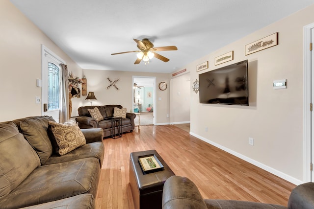 301 Lake Dr, Branson, MO 65616 - living room with ceiling fan, light wood finished floors, and baseboards